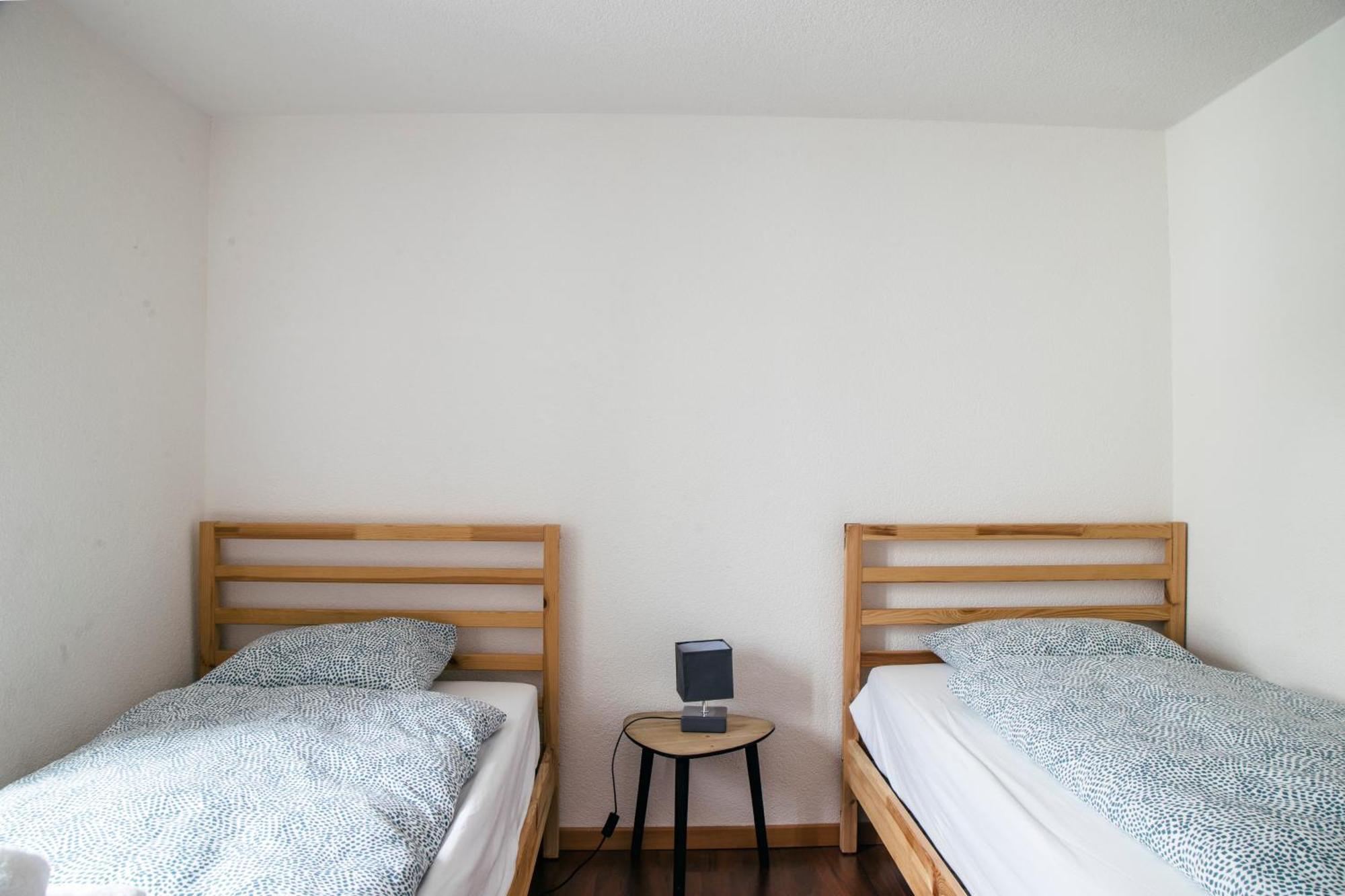 Nimbuzzz Apartments Unterseen Værelse billede